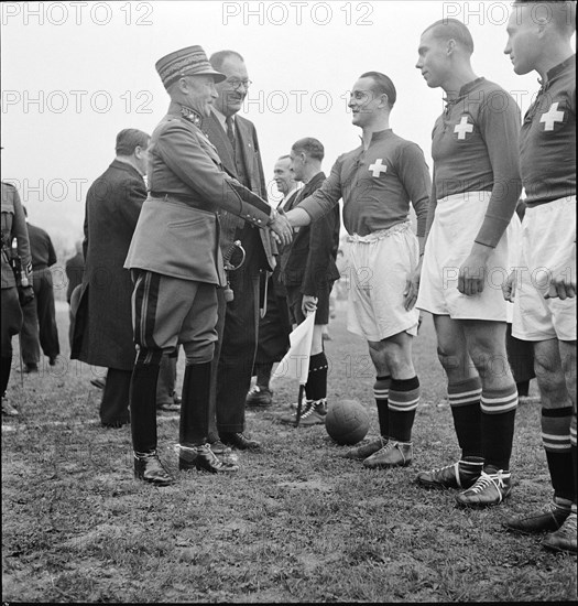 General Guisan greets the Swiss national soccer team, 1939.