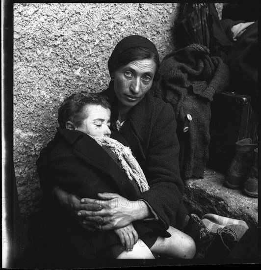 Italian refugees. woman. child. 1944