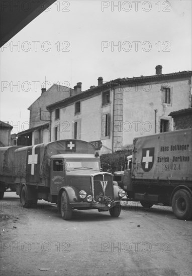 Trucks in transit from Spain to Switzerland, near La Voulte-sur-Rhône; 1944.