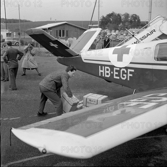 Swiss sports pilot with medicaments for Hungary, Kloten around 1956.