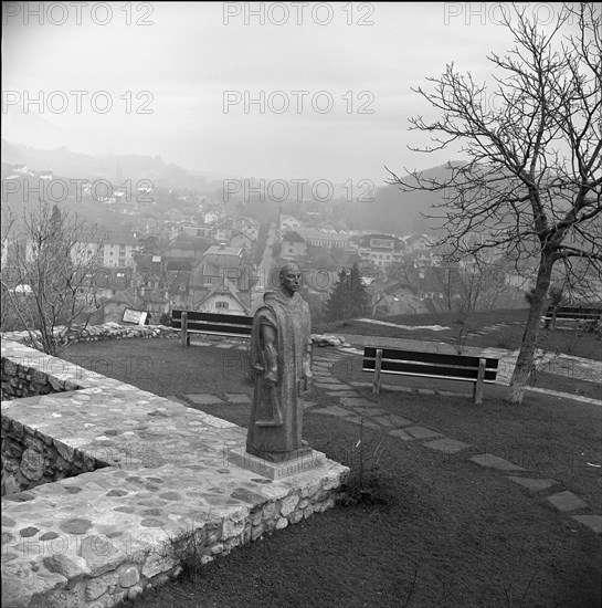 Statue of a monk Le Defricheur at Boudry Castle, 1960.