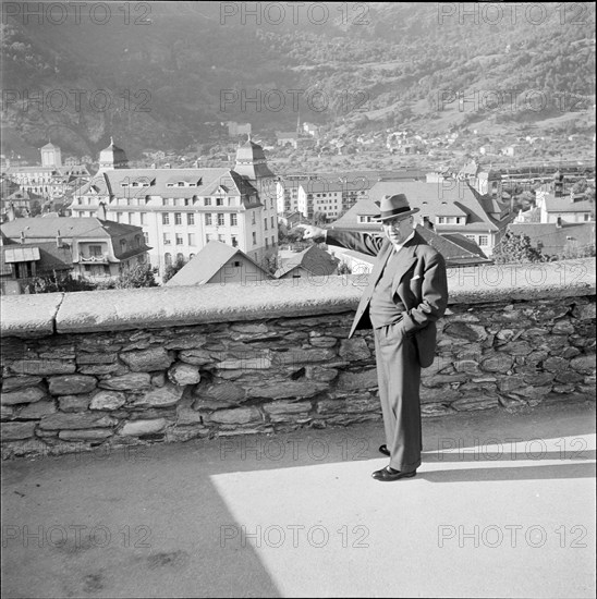 Federal Councillor Josef Escher taking a walk Brigue 1950.