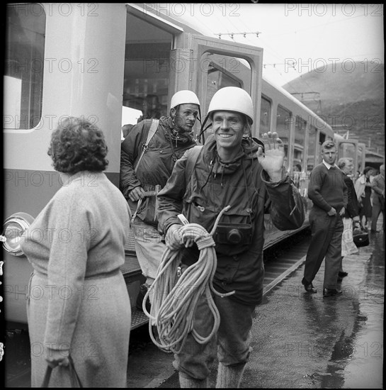 Kurt Diemberger and Wolfgang Stephan after climbing up the Eiger North Face 1958 .