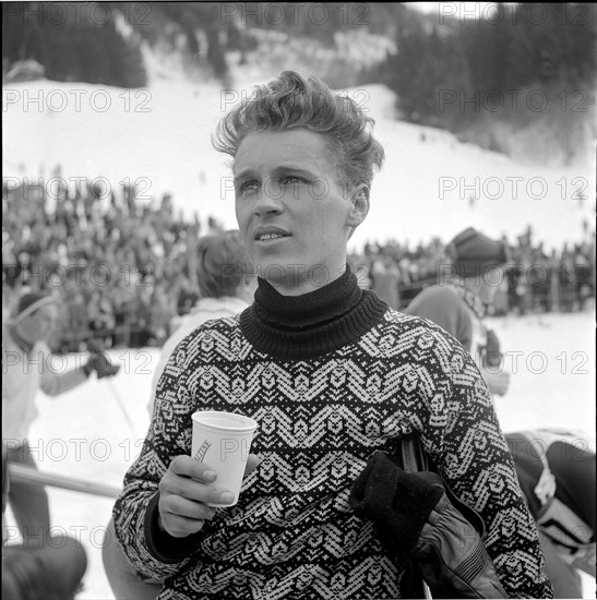 Josl Riederer, Austrian skier, with cup of Ovomaltine, 1958.