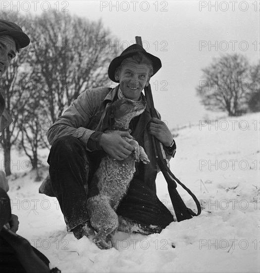 Georges Schneider, Swiss skier, hunting, 1949.