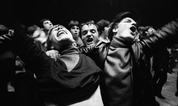 Cheering fans at Rolling Stones concert at Hallenstadion, Zurich 1967 .