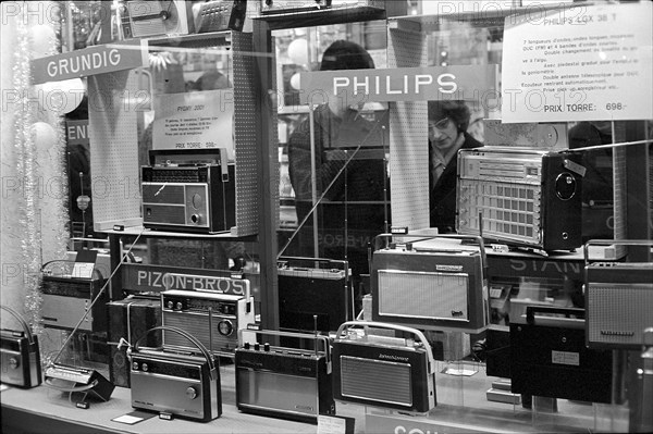 Radios in a shop window, 1973 .