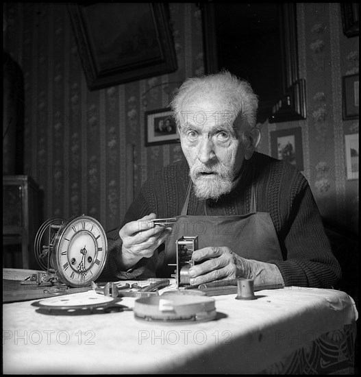 Jean Schütze, watchmaker, 1952