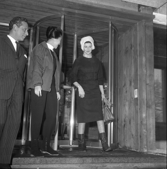 With Queen Sirikit of Thailand (L) leaving the Palace Hotel