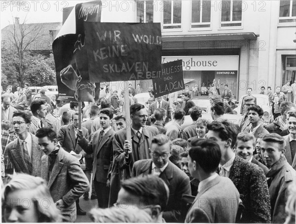 Protest against exhibition of products made in East Germany. 1957