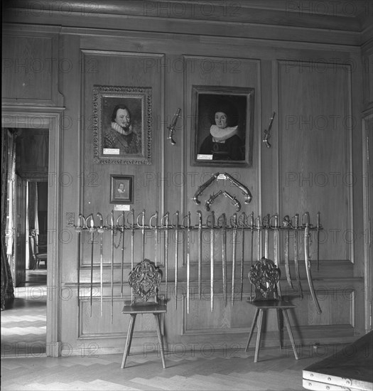 Sabres on a wall at Jegenstorf Castle, around 1955