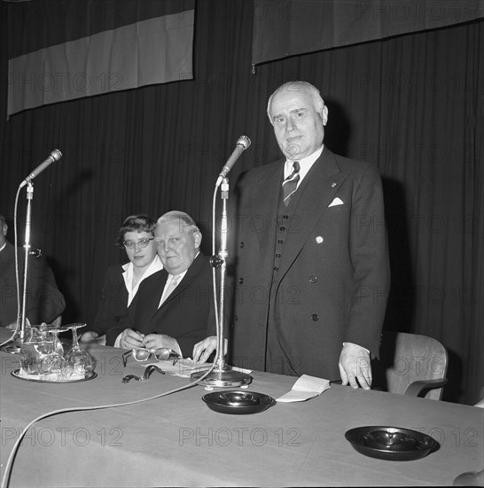 Ludwig Erhard and Prof. Jacques Rueff (standing), economic talk in Zurich 1959