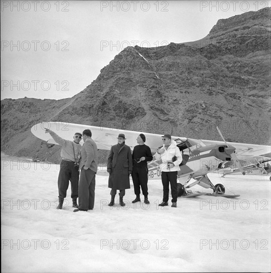 Ambassador Henry J. Taylor and Hermann Geiger, glacier pilot 1957