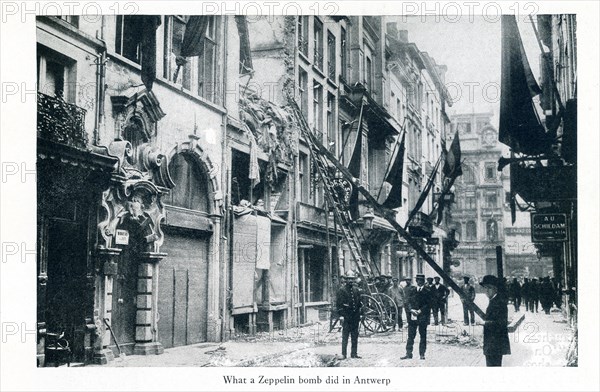 This photo taken in Belgium in early World War I has the caption: What a Zeppelin bomb did in Antwerp. Antwerp is a Flemish city inthe country of Belgium. Zeppelin refers to a large cylindrical rigid airship built from 1900 to carry passengers. The Germans used them in World War I for bombing and reconnaissance.