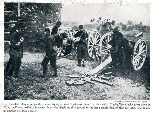 This photo taken in early World War I has the caption: French artillery in action, the gunners trying to protect their ear-drums from the shock. During Von Kluck's great drive on Paris, the french artillery did wonderful servie in holding their ground to the last possibe moment then retreating and taking up another defensive position.