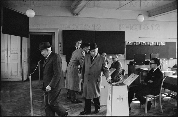 Men in polling station in Zurich, 1966.