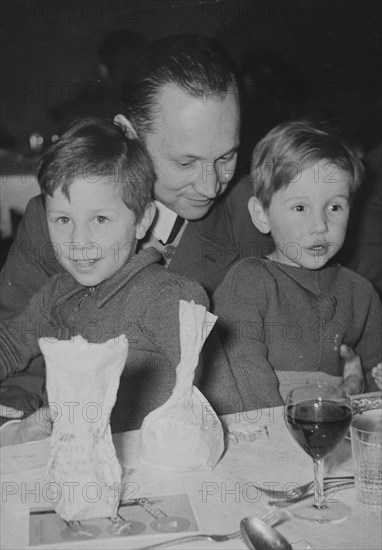 Dr. Brunner, chief physician of Zurich cantonal hospital, with his children, sons Felix and Alfred.