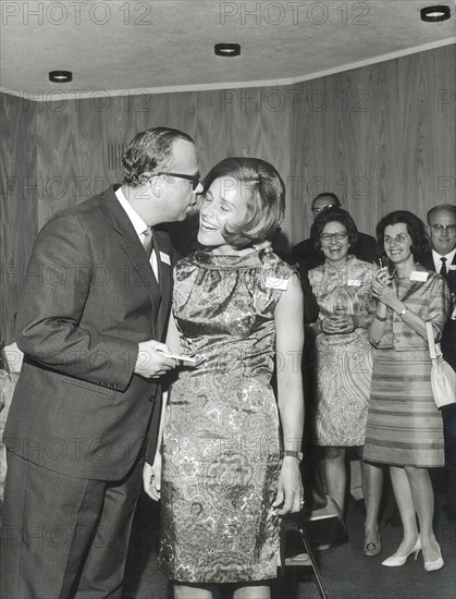 Hans Gmur kissing the ""Ideal Swiss Woman 1967"" Milena von Below.