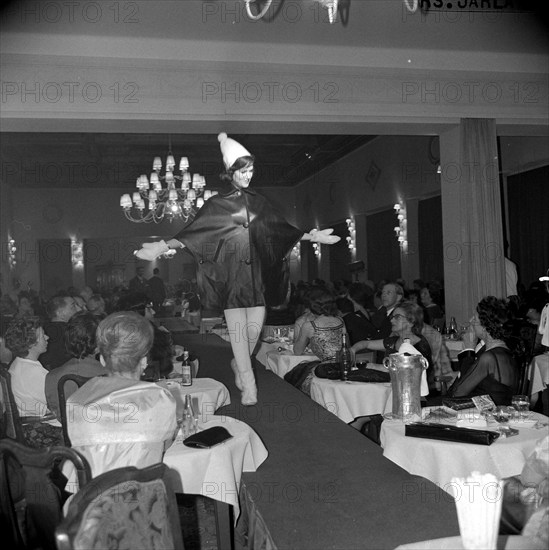 fashion show in the Palace hotel, St. Moritz, model on catwalk, 1962.