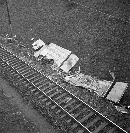 Fall of a german truck upon railway track because of speeding, 1957.