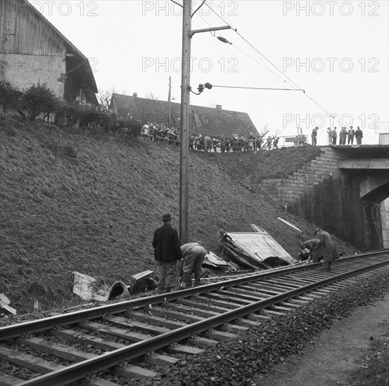 Fall of a german truck upon railway track because of speeding, 1957.