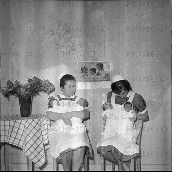 Children's nurses with the babies born New Years night, Zurich 1965.