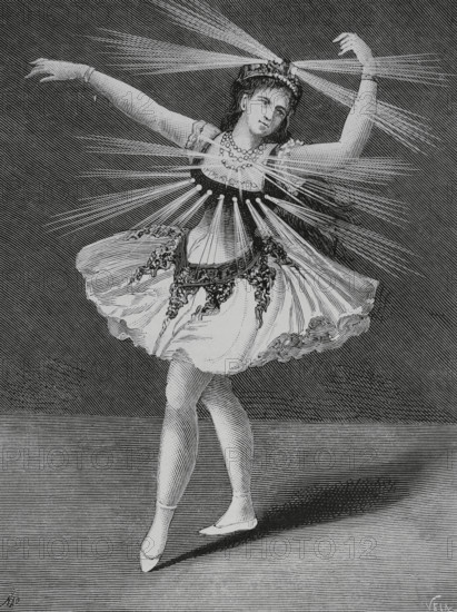 France. Paris Opera. ""La Farandole"". Three-act ballet by the French composer Theodore Dubois (1837-1924), 1883. Dancer during a performance of ""La Farandole"", presented in mid-December 1883, adorned with electric jewels, Trouve system. In the scene of ""the temptation"", which takes place in the Arles Amphitheatre, a unanimous applause from the audience greeted the appearance of the Arlesian fairies wearing jewels and brilliant colours on their diadems, necklaces and overalls, as depicted in the engraving. Drawing by Manuel Nao (1843-1884). Engraving by Vela. La Ilustracion Espanola y Americana (The Spanish and American Illustration), March 8, 1884.