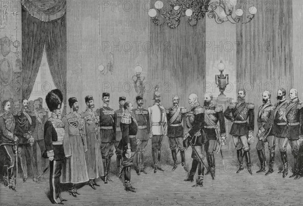 History of Germany. Berlin. Imperial Palace. The Russian Military Deputation congratulating Emperor Wilhelm I of Germany (1797-1888) on the 70th anniversary of the Battle of Bar-sur-Aube (27 February 1814), with victory of the Russo-Bavarian coalition against Napoleon I during the 1814 campaigns. The ceremony was held on 27 February 1884. The German Emperor was accompanied by all the princes of the Imperial family and the Prussian field marshal Helmuth von Moltke (1800-1891). The Russian delegation was headed by the Grand Duke Michael Alexandrovich of Russia (1878-1918), youngest brother of the last Tsar Nicholas II, as well as Generals Iosif Gurko (1828-1901), Ivan Mikhailovich Obolensky (1853-1910), and Count Pyotr Andreyevich Shuvalov (1827-1889). Engraving. La Ilustracion Espanola y Americana (The Spanish and American Illustration), March 22, 1884.