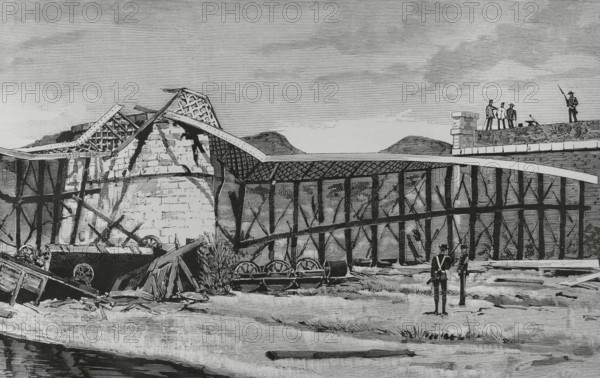 History of Spain. Alcudia bridge disaster. Located at kilometre 279 of the railway line from Madrid to Ciudad Real and Badajoz, between the stations of Almadenejos and Chillon. The bridge collapsed suddenly in the early hours of 27 April 1884, when mixed train number 51 passed, plunging the locomotive, the tender, four cattle cages and seven wagons with numerous passengers to the bottom of the river. Fifty-nine people lost their lives, most of them recently discharged soldiers. Drawing by Manuel Alcazar. Engraving by Rico. Detail. La Ilustracion Espanola y Americana (The Spanish and American Illustration), May 8, 1884.