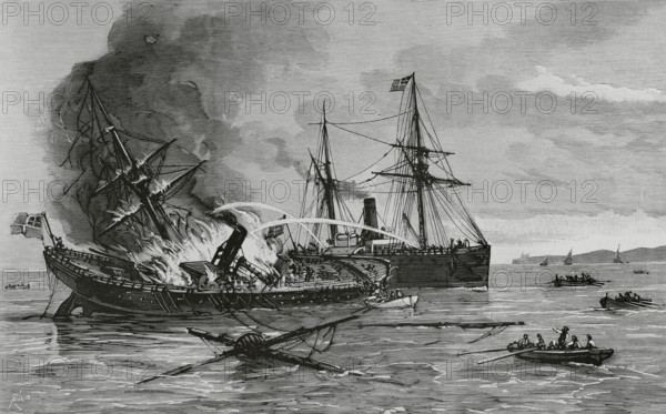 History of Spain. Catalonia. Tarragona. Fire on the merchant steamer ""Carmen"", off the mouths of the Ebro River, in the early hours of 29 May 1884. The ship's captain, Pedro Jose Guerra, ordered the evacuation of the entire crew when it was no longer possible to extinguish the fire. The Swedish merchant steamer ""Baltzar van Plater"" found the ship on fire and offered to help. Drawing by Monleon. Engraving by Bernardo Rico (1825-1894). La Ilustracion Espanola y Americana (The Spanish and American Illustration), June 8, 1884.