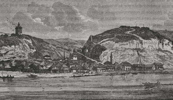 Nikopol. General view of the city on the shores of the Danube River, on present-day Bulgarian territory. The city, under Ottoman rule, was captured by the Russians in 1877 during the Russo-Turkish War (1877-1878). Engraving. ""La Guerra de Oriente"" (The Russo-Turkish War). Volume II. 1877.