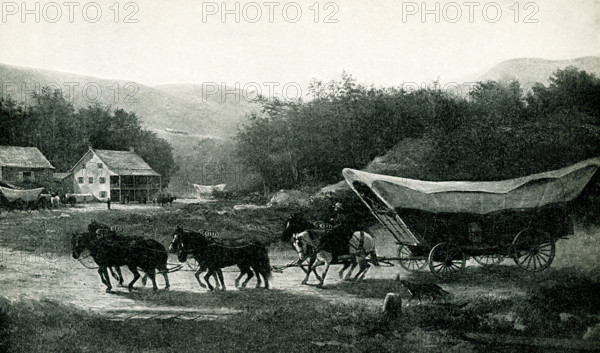 Shown here is an early mode of transportation in the United States - the Conestoga Wagon. The Conestoga wagon was a sturdy wagon that was covered. It could carry nearly 12,000 pounds of goods and was built to prevent shifting of those goods on bumpy roads and travel through difficult terrain such as water.