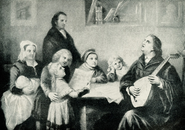 Luther’s Evening at Home. Martin Luther is pictured here at home with his family, singing as he plays his instrument. Martin Luther (1483–1546) was the German leader of the Protestant Reformation. In 1521, he was formally excommunicated from the Roman Catholic Church and summoned before the Diet of Worms. The Diet had been called by Emperor Charles V and, among other matters, took up the doctrines spread by Luther. Luther arrived under safe conduct on April 16, refused to yield ground in lengthy arguments with theologians. Katarina von Bora (1499-1552) was the wife of Martin Luther, and they had six children.