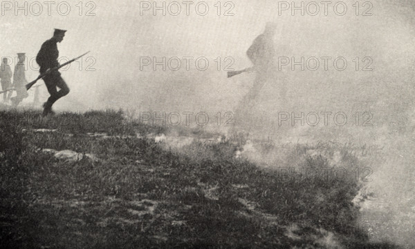 This photo shows Private Peat who fought in World War I. The caption reads: “Behind the Barrage.”  It appeared in Harold R Peat's book 'Private Peat' published in 1917.