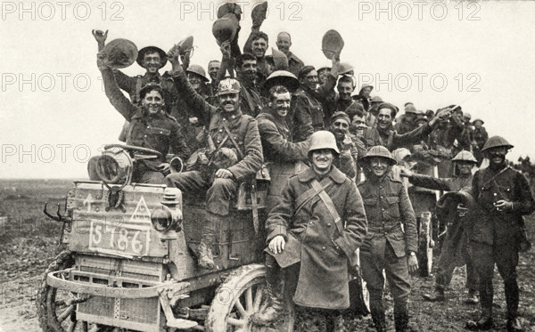 This photo  shows Canadian troops on their way to fight in World War I. It appeared in Harold R Peat's book 'Private Peat' published in 1917.