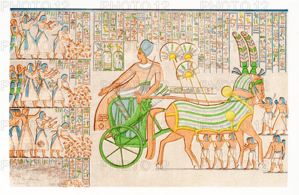 This colored chariot bas-relief is from  the gallery south of the peristyle in Thebes at Medinet Habu. Medinet Habu is the mortuary temple of the Egyptian 20th Dynasty pharaoh Ramesses III (c. 1150 B.C.) on the West Bank of ancient Thebes (present-day Luxor).