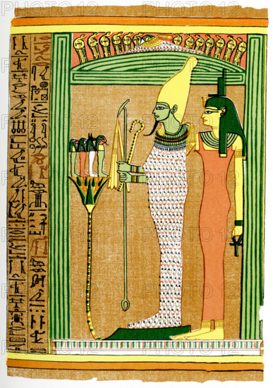 The caption on this 1903 image reads: “Osiris and Isis and Four Children of Horus.” It appeared in the book History of Egypt by French Egyptologist Gaston Maspero. Here, Osiris, the Egyptian god of fertility and of the dead, wears the white crown of Upper Egypt and the menat (amulet weighted to counterbalance heavy collar). He holds in his hands the scepter, crook, and flail—all royal symbols. Standing behind him is his wife Isis, the Mother Goddess. In front of him are the four children of his son Horus.