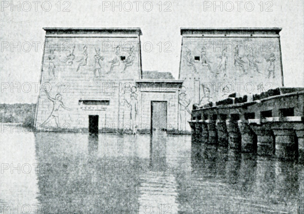 This photo shows the south front of temple of Isis at Philae during the inundation period, the time of year when the Nile annually overflowed it banks - before the building of the Aswan Dam. Construction on the temple began around 280 B.C. The photo was taken by the Italian archaoelogist Guiseppe Fiorelli in the 1800s.