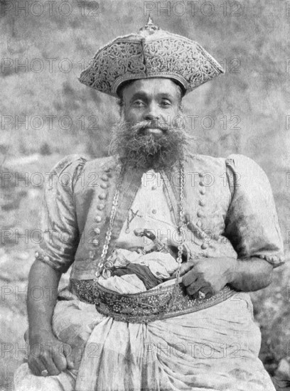 Kandy is the second largest city on the island of Sri Lanka, formerly known as Ceylon. This photo from Penrose Pictorial Annual for 1900 shows a Kandyan chief at the time that the island was part of Great Britain's colonial empire. In the 1800s Sri Lanka had come under British control. It gained its independence in 1948.