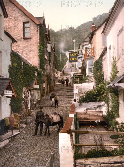 Clovelly Is A Fishing Village On The North-East Coast Of Devon In Great Britain / The High Street