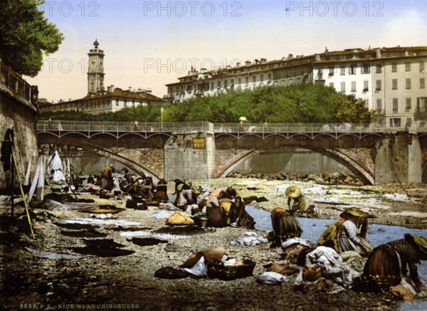 Washerwomen washing clothes in the river, Nice, France, around 1895, Historical, digitally restored reproduction from an original from the 19th century.