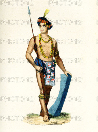 This 1840s illustration shows a man with his weapons from Tondano on Sulawesi, one of the islands in the Celebes Sea, part of Greater Sunda Islands in Indonesia.