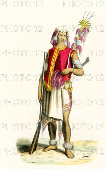 This 1840s illustration shows a warrior from Timor, from the territory known as the Amfoang Kingdom, now in West Timor. Timor is an island at the southern end of Maritime Southeast Asia, in the north of the Timor Sea. The island is divided between the sovereign states of East Timor on the eastern part and Indonesia on the western part. The Indonesian part, also known as West Timor, constitutes part of the province of East Nusa Tenggara. Timor is part of the area of the world known as Oceania. Oceania is a geographic region that includes Australasia, Melanesia, Micronesia and Polynesia. Spanning the Eastern and Western Hemispheres, Oceania has a land area of 8,525,989 square kilometers.