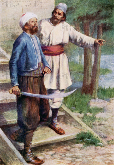 The caption for this illustration reads: He asked the Era where he had hidden the thief. Era is a name given to the peasants of the district of Ouzitze in Western Serbia. Era are said to be very witty and shrewd. According to the tale: A Turkish man and his wife were traveling and the Turk stopped and told his wife to wait for him while he took the horse to get water. Wghile he was away an Era approached the wife and said he was from the Afterlife. The wife asked about her dead son, and the Era said he knew him well and that he could use some money there. The wife gave the Era money. The Turk returned, angered that his wife had been tricked, and chased the era, who had run into a mill and forced the miller out. The Turk entered the mill, thinks the guy there is the miller and tells him his tale (seen here). The Turk, with his sabre, then chases the real miller, finds him, and threatens him. He soon realizes the Era has tricked him as well, returns to his wife, who no longer has a horse...