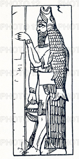 This illustration dates to around 1898 and shows Anou or Dagon from a relief at Nimroud (also spelled Nimrod). Dagon is an ancient Mesopotamian deity, often associated with fertility and agriculture. The fish seen here with him was known as dag, hence the reason for his name. Nimroud (also spelled Nimrod) is the Assyrian name for the city of Kalhu on the Nineveh plains. Nimroud is located south of present-day Mosul in Iraq. Anou (also spelled Anu) was the ancient Mesopotmaian god of the sky. Anou was originally the supreme deity of the  Babylonian pantheon.