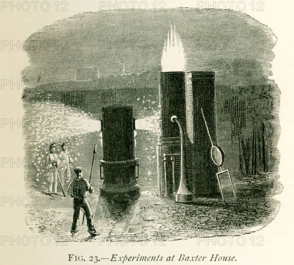 This illustration dates to the 1870s and shows experiments at Baxter House at producing steel. On of the key figures in doing so was a Mr. Bessemer, who discovered that carbon and silicon may be readily removed by forcing currents of cold air through a mass of fused metal and announced his discovery in 1856. HIS PAPER WAS TITLED ""ON THE MANUFACTURE OF IRON AND STEEL WITHOUT FUEL."" Bessemer carried out experiments at Baxter House in in England - as shown here. The apparatus used in these experiments was a cylindrical vessel, in the bottom of which were a number of clay nozzles (tuyeres) through which the blast from a blowing machine could be forced.