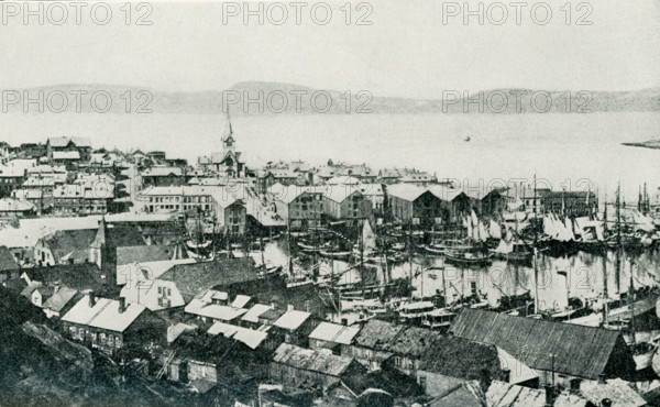 This photo dating to the 1920s has the caption: Hammerfest, the town farthest north. Hammerfest is a town in northern Norway on Kvaloy Island. It is the northernmost town in Europe and its harbor is always ice-free.