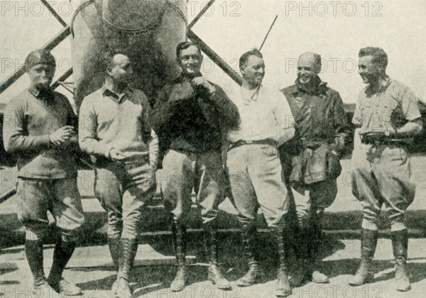 These photos dates to 1924. The caption reads: The First Men to Fly Around the World. In the upper picture is shown the return of the United States Army aviators to San Diego, Calif., September 22, 1924, after their world-girdling flight. Their total flying time was 375 hours 11 minutes. Below are the navigators of the three successful planes, Lieutenants Wade, Arnold, Smith, Ogden, Nelson, and Harding.