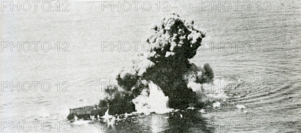 This photo dates to September 5, 1923. The caption reads An 1100-pound bomb explodes alongside. In 1922, the U.S. War Department classified the Virginia as a target ship for bombing tests, along with her sister ship the USS New Jersey. The New Jersey was bombed first and sunk and then the Virginia.