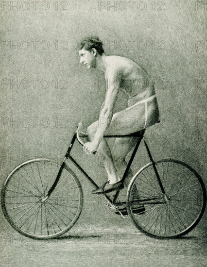 The 1897 caption for this illustration reads: The Wheel of Today,  A side view of A A Zimmerman in racing position on a wheel of his own design. Arthur Augustus Zimmerman was one of the world's greatest cycling sprint riders and winner of the first world championship in 1893. His prizes as an amateur were a consideration in the establishment of the International Cycling Association.